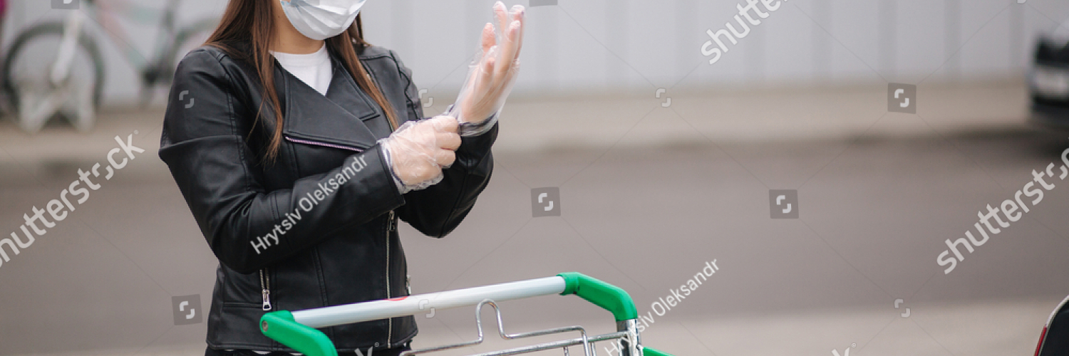 stock photo a young attractive woman taking groceries from a supermarket from the trolley to car truck social 1840953253