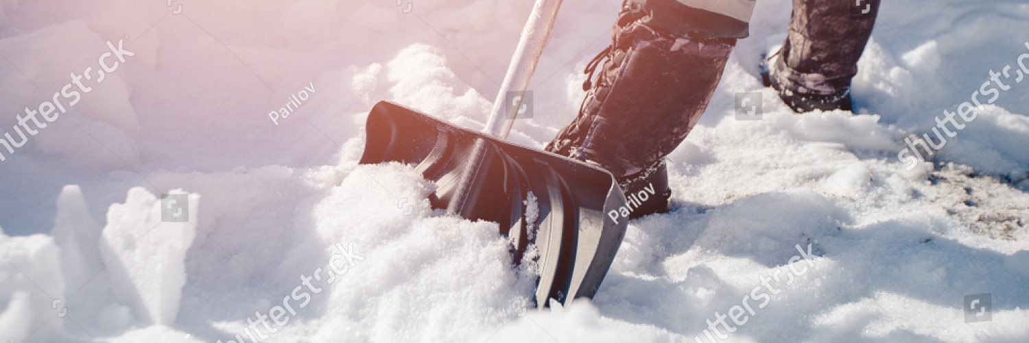 stock photo city service cleaning snow winter with shovel after snowstorm yard sunlight 1176532801