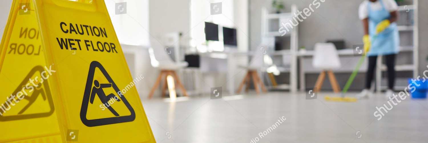 stock photo close up plastic caution sign with figure that slips and falls warning us of wet slippery office 2029733135