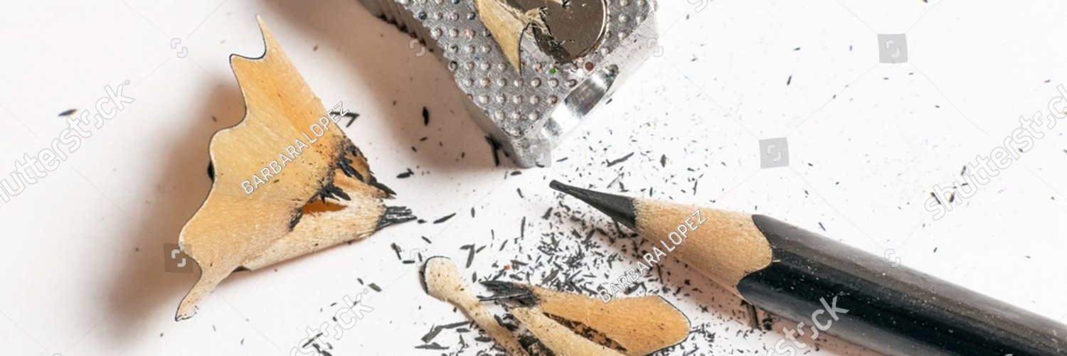 stock photo metal pencil sharpener with black pencil shavings horizontal photography color 2252372645