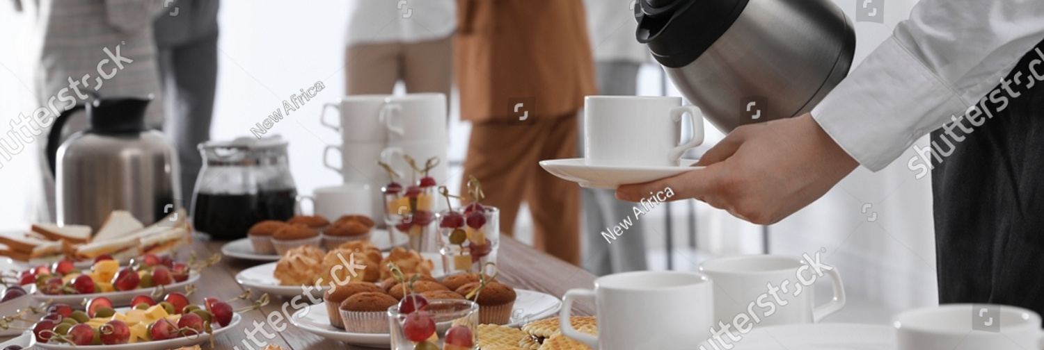 stock photo waitress pouring hot drink during coffee break closeup 2133335219