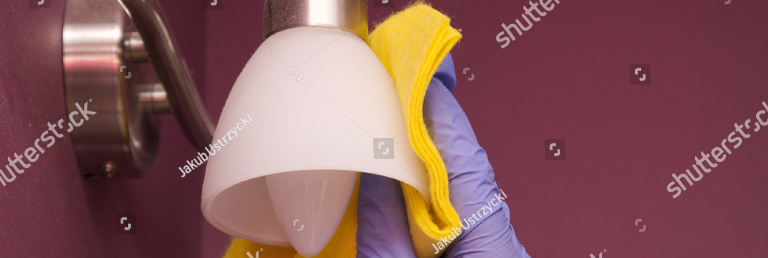 stock photo washing the chandelier washing the sconce spring cleaning vacuuming the walls and chandelier 1123850678